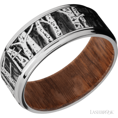 9 mm wide/Flat Grooved Edges/Cobalt Chrome band with a laser carved Aspen pattern also featuring a Leopard Wood sleeve.